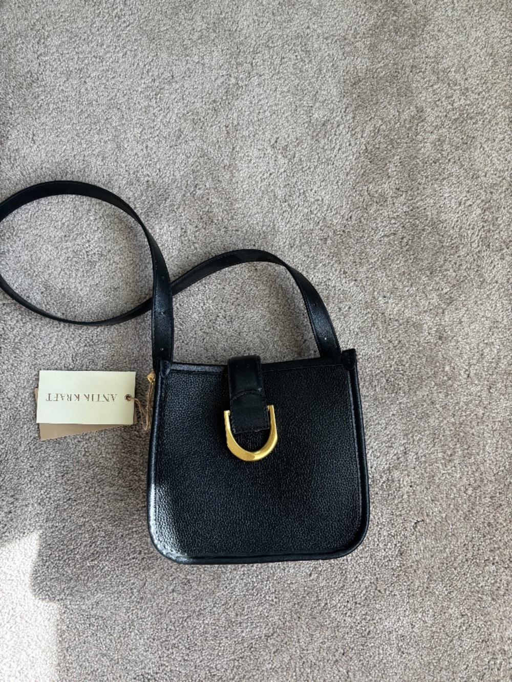 Black, full leather fashion bag